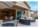 Spacious patio with a seamless indoor/outdoor flow, comfortable seating, and outdoor television for entertaining at 4519 N 29Th Way, Phoenix, AZ 85016