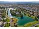 Breathtaking aerial view of waterfront homes along a tranquil lake at 5 E Oakwood Hills Dr, Chandler, AZ 85248