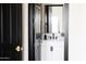Elegant bathroom featuring a vanity with marble countertop and black hardware at 5 E Oakwood Hills Dr, Chandler, AZ 85248