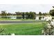 Scenic pond view with lush greenery and a clear blue sky, providing a tranquil atmosphere at 5 E Oakwood Hills Dr, Chandler, AZ 85248