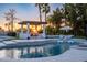 A fabulous sunset sets the stage for this incredible pool and patio with outdoor seating at 5 E Oakwood Hills Dr, Chandler, AZ 85248
