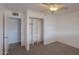 Bright bedroom features neutral carpet and closet space, providing a comfortable retreat at 512 N Ironwood --, Mesa, AZ 85201