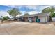 Charming single-story home featuring a cozy front porch with hanging swing and modern outdoor seating at 512 N Ironwood --, Mesa, AZ 85201