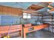 This garage area features a dedicated workshop space and abundant storage for DIY projects at 512 N Ironwood --, Mesa, AZ 85201