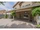 Relaxing backyard patio offers a covered space perfect for outdoor seating and entertaining at 533 N Cobblestone St, Gilbert, AZ 85234