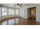 Bright bedroom with wood floors, lots of windows and a view to another room at 533 N Cobblestone St, Gilbert, AZ 85234