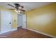 Bedroom featuring wood floors and an open doorway at 533 N Cobblestone St, Gilbert, AZ 85234