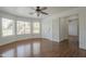 A large bedroom has three windows offering natural light and a connecting door to another room at 533 N Cobblestone St, Gilbert, AZ 85234
