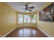 Cozy bedroom featuring hardwood floors and bay windows at 533 N Cobblestone St, Gilbert, AZ 85234