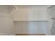 Walk-in closet features built-in shelving at 533 N Cobblestone St, Gilbert, AZ 85234