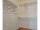 Walk-in closet with shelving for optimal storage at 533 N Cobblestone St, Gilbert, AZ 85234