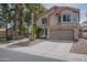 Charming two-story home featuring a two-car garage, desert landscaping, and a red tile roof at 533 N Cobblestone St, Gilbert, AZ 85234