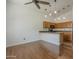 Eat-in kitchen featuring granite countertops and modern pendant lighting at 533 N Cobblestone St, Gilbert, AZ 85234
