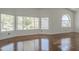 Sun-filled living room featuring hardwood floors and large windows that provide natural light and great views at 533 N Cobblestone St, Gilbert, AZ 85234
