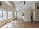 Spacious living room featuring hardwood floors, large windows, and open design at 533 N Cobblestone St, Gilbert, AZ 85234