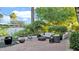 Inviting backyard featuring a fire pit, comfortable seating, lush landscaping, and a tranquil ambiance at 5714 N 11Th St, Phoenix, AZ 85014