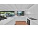 Stylish white kitchen with backyard views and modern finishes at 5714 N 11Th St, Phoenix, AZ 85014