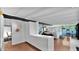 Modern living room featuring white walls, beams, and an open layout at 5714 N 11Th St, Phoenix, AZ 85014