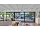 Living room with views of a charming outdoor lounge, and lush garden at 5714 N 11Th St, Phoenix, AZ 85014