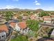 Set in a scenic locale, this property boasts a red tile roof, lush landscaping, mountain views, and a private backyard at 6145 E Snowdon St, Mesa, AZ 85215