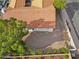 Aerial view of a red tiled roof, desert landscaping, and a private yard bordered by a block wall at 6145 E Snowdon St, Mesa, AZ 85215