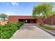 Attractive building entrance framed by manicured greenery, creating a serene and inviting approach at 6145 E Snowdon St, Mesa, AZ 85215