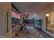 Cozy covered patio with stylish furniture, an outdoor rug, and views of the backyard at 6145 E Snowdon St, Mesa, AZ 85215