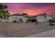 Charming single-Gathering home featuring a well-maintained yard and beautiful desert sunset at 6145 E Snowdon St, Mesa, AZ 85215