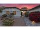 Inviting front entrance with landscaped walkway leading to a well-maintained single Gathering home at 6145 E Snowdon St, Mesa, AZ 85215
