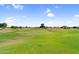 Scenic view of the lush green golf course, showcasing the well-manicured lawns and inviting landscape at 6145 E Snowdon St, Mesa, AZ 85215