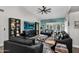 Gathering room with a large TV, comfortable seating, and stylish decor at 6145 E Snowdon St, Mesa, AZ 85215