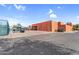 A community building with an adjacent tennis court and parking area at 6145 E Snowdon St, Mesa, AZ 85215
