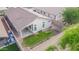 Aerial view of a fenced backyard with a covered patio and small grassy area perfect for outdoor entertaining at 636 E Redondo Dr, Gilbert, AZ 85296