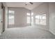 Bright, spacious bedroom with high ceilings and multiple windows for natural light at 636 E Redondo Dr, Gilbert, AZ 85296