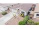 Aerial view of a well-maintained single-story home with desert landscaping and a spacious driveway at 636 E Redondo Dr, Gilbert, AZ 85296