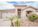 Charming home featuring a well-manicured yard, a two-car garage, and a tiled roof at 636 E Redondo Dr, Gilbert, AZ 85296
