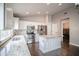 Bright kitchen features granite countertops, stainless steel appliances, and a convenient center island at 636 E Redondo Dr, Gilbert, AZ 85296