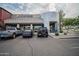 Exterior front view of an Over Easy restaurant featuring modern architecture and ample parking at 636 E Redondo Dr, Gilbert, AZ 85296