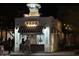 A well-lit Topo restaurant, serving Burritos and Soft Serve, at night at 636 E Redondo Dr, Gilbert, AZ 85296