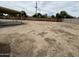 Spacious backyard with gravel and a covered patio area at 6842 S 42Nd Pl, Phoenix, AZ 85042