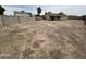 Gravel backyard surrounded by block and wooden fencing at 6842 S 42Nd Pl, Phoenix, AZ 85042
