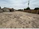 Large backyard features a wooden fence and gravel landscaping at 6842 S 42Nd Pl, Phoenix, AZ 85042