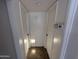 A hallway with a pet door and doors on either side at 6842 S 42Nd Pl, Phoenix, AZ 85042
