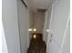 Bright hallway with tile flooring and white walls offers a clean, modern look at 6842 S 42Nd Pl, Phoenix, AZ 85042