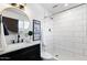 Modern bathroom featuring sleek fixtures, bright lighting, and stylish tile, providing a luxurious experience at 6923 E Hubbell St, Scottsdale, AZ 85257