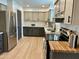 Modern kitchen featuring stainless steel appliances, stone countertops, and ample cabinet space at 6923 E Hubbell St, Scottsdale, AZ 85257