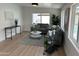 Comfortable living room featuring modern decor, a stylish coffee table, and views of the backyard at 6923 E Hubbell St, Scottsdale, AZ 85257