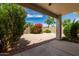 Backyard with gravel, trees, plants, and block fence at 710 W Cherrywood Dr, Chandler, AZ 85248