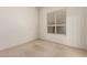 Empty room with carpet and a window with blinds at 710 W Cherrywood Dr, Chandler, AZ 85248