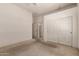 Bedroom with closet and entry to an adjacent bathroom at 710 W Cherrywood Dr, Chandler, AZ 85248